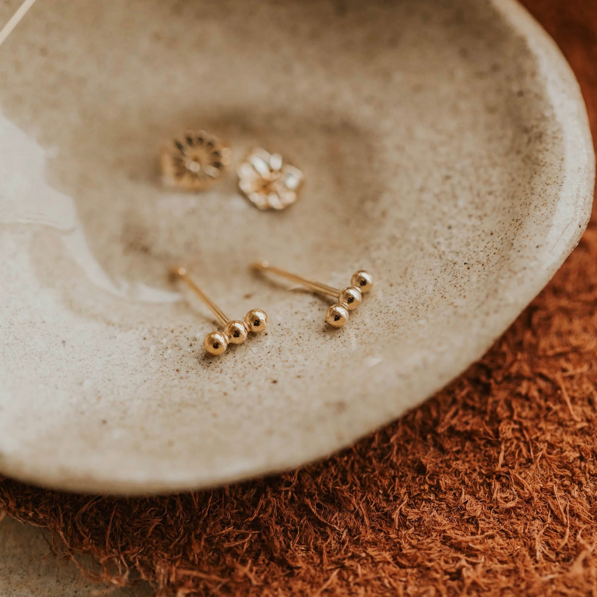 Gold triple dot studs 